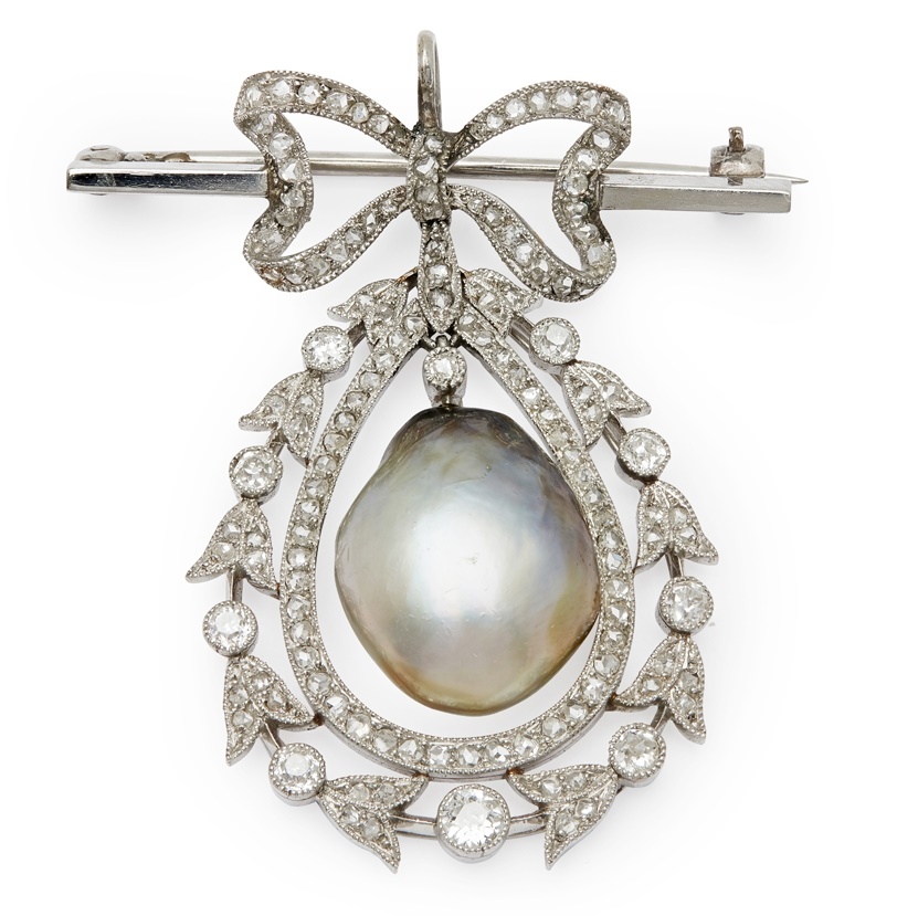 LOT 97 A natural pearl and diamond set pendant brooch 